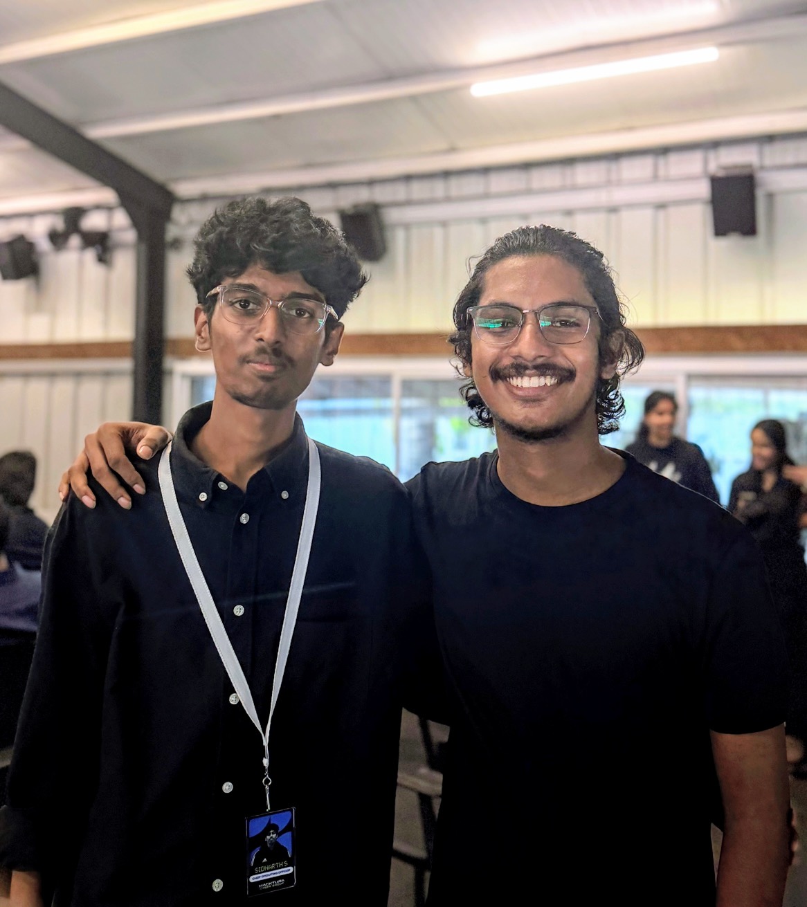 COO Sidharth (zidhuxd) with Deepu A, cybersecurity mentor at Hacktura Cyber Convergence 2026